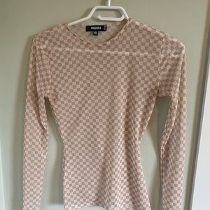 Misguided checker top